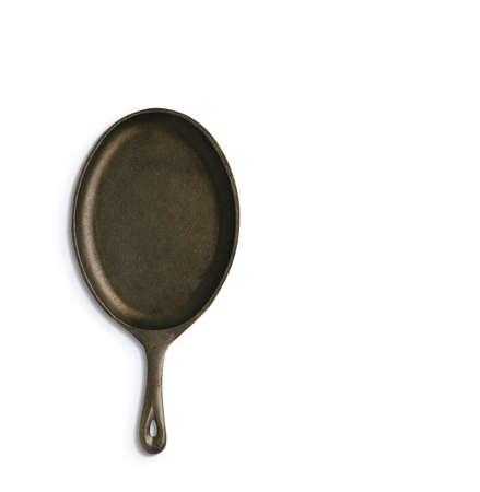 Close up of isolated frying pan against white background. fix with your project element.の写真素材