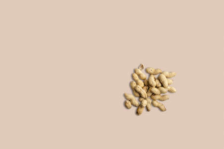 Top view of isolated raw peanuts , close up peanut photo. Close up photo of top view peanuts, raw peanuts in the nutshellsの写真素材