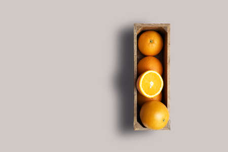 Top up up view fresh oranges isolated on gray background. suitable for your design project.の写真素材