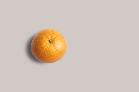 Top up up view fresh orange isolated on grey background. suitable for your design project.