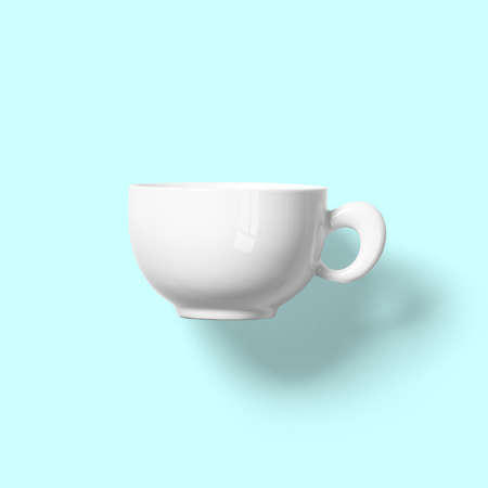 blank white bowl isolated on blue background.の写真素材