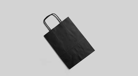 An isolated view of the black Tote bag on an grey background.の写真素材