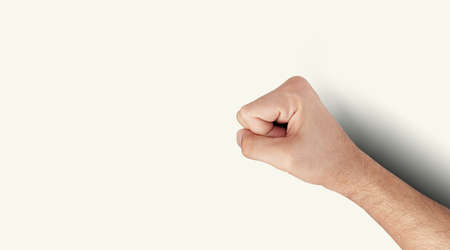 Top up view man fist on white background. added copy space for text.の写真素材