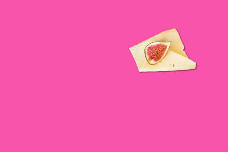 Cheese piece in Creative conceptual top view flat lay composition with copy space isolated on pink...