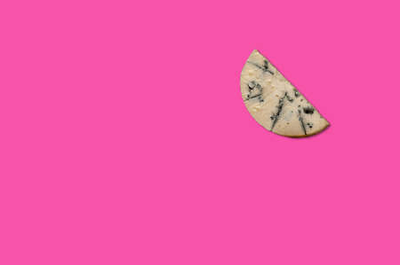 Cheese piece in Creative conceptual top view flat lay composition with copy space isolated on pink...