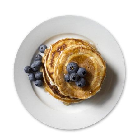 Blueberry Ricotta Pancakes on white background with flat lay style.の写真素材