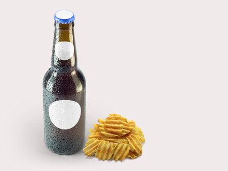 Potatoes chip snacks and brown bottle isolated on colored background. oktoberfest concept.の写真素材