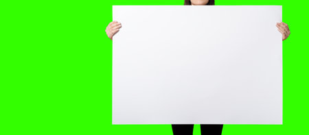 Beautiful Woman holding blank signboard on green screen background. suitable your element project. added copy space for text.の写真素材