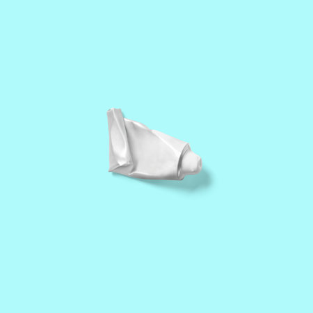 Top view of a white object isolated on a blue background. Suitable for your design project.