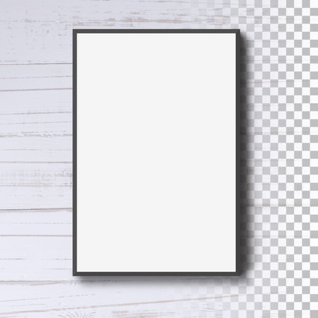 Isolated blank photo frame on the wallの写真素材