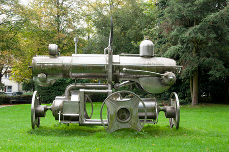 AACHEN, GERMANY. OCTOBER 04, 2020. Locomotive made of stainless steel scrap by Albert Sous, put up...
