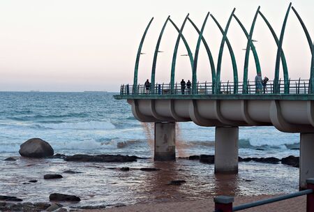 DURBAN, SOUTH AFRICA - JULY 11, 2016: People on the Millennium Pier at the beach in Umhlanga Rocksのeditorial素材