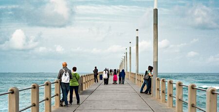 DURBAN, SOUTH AFRICA - AUGUST 17, 2015: People on the pier at North Beach Durbanのeditorial素材