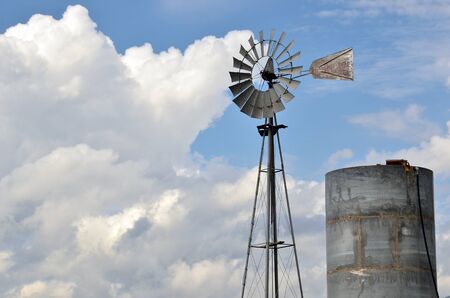 Old western windmillの写真素材