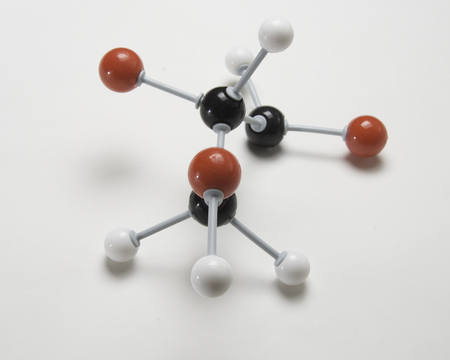 Chemical model with red,whte and black balls to signify atoms.の写真素材