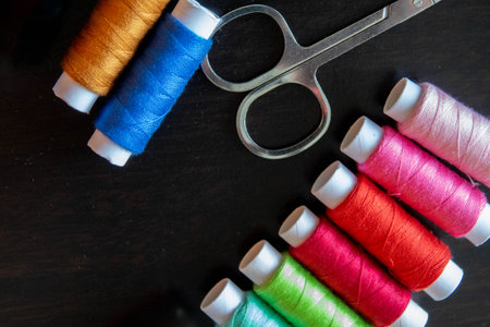 Different colored sewing threads for arts and crafts or clothing repair