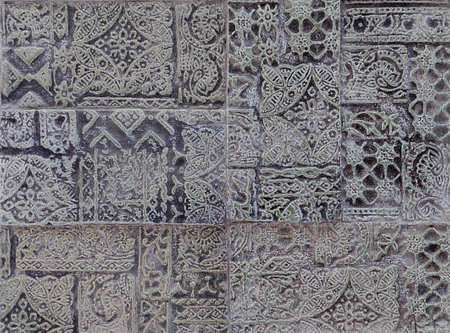 Ethnic engrave ornamental 3D molded tiles, in grey colour finishes and abstract ethnic pattern details.の写真素材