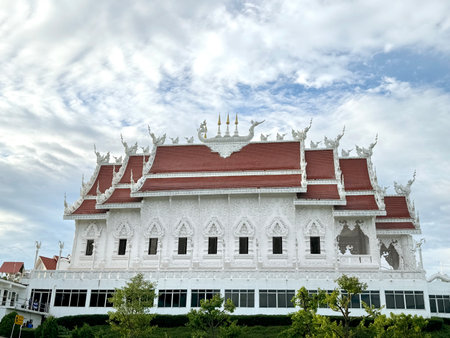 Wat Huay Pla Kang, or Temple of Goddess of Mercy, at Chiang Rai, Thailand. Seen here is the white temple with the famous dragon pagoda at the complex.の写真素材
