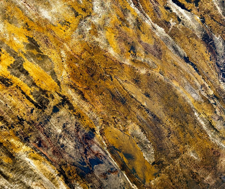 Yellow Gold Onyx Stone with LED backlight shining from behind. Natural onyx is frequently used as luxurious decorative materials for high end interior design wallsの写真素材
