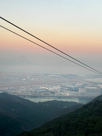 Breathtaking view of cable car Ngong Ping 360, at Lantau Island, Hong Kong. Ngong Ping is one of famous destination at Hong Kong with the cable car to see the hills country sideの写真素材