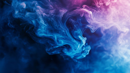 Blue and pink smoke on a black background. Background from the smoke of vapeの素材