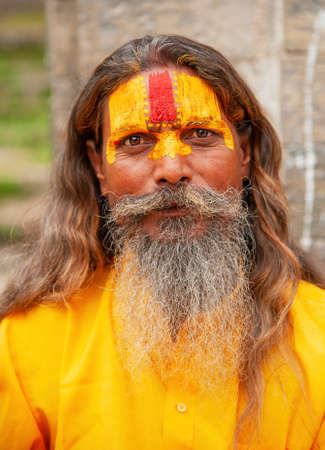 Kathmandu, Nepal - October 16, 2010: Sadhu holy man at the Pashupatinath Temple in Kathmanduのeditorial素材