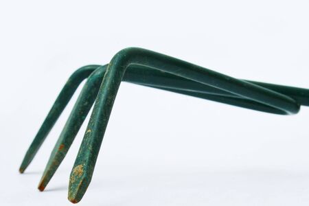 Hand rake for gardening against white backgroundの写真素材