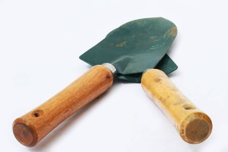 Two garden trowels against white backgroundの写真素材