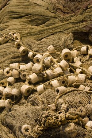 Close-up of fishing nets piled up