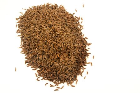 Cumin seeds isolated on whiteの写真素材
