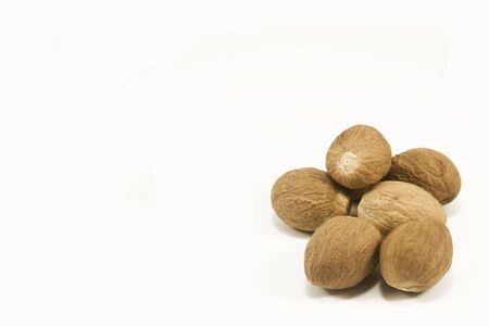Nutmeg isolated on whiteの写真素材