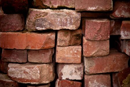 Close-up of a stack of used brickの写真素材