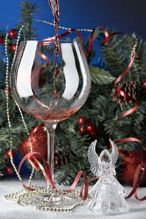 Still life with glass in front of fir treeの写真素材