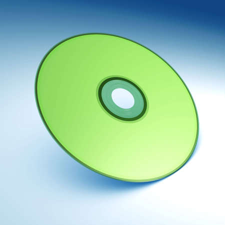 green optical disk on blue backgroundの写真素材
