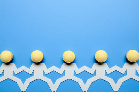 Chain of paper figuresの写真素材