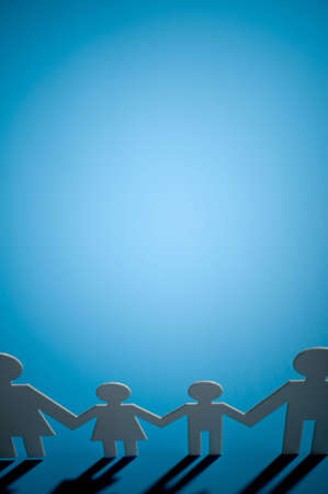 Chain of paper figuresの写真素材