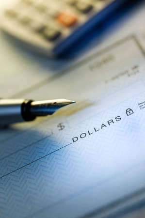 Money check and penの写真素材