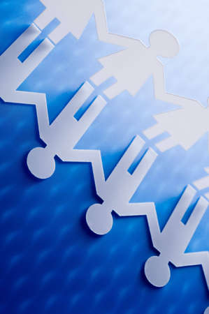 Chain of paper figuresの写真素材