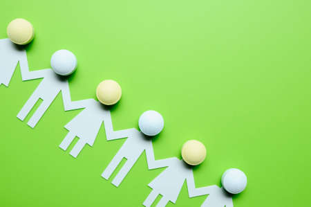 Chain of paper figuresの写真素材