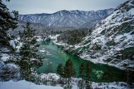 Mountain river Katun, Altai, Russia. A winter scenic.