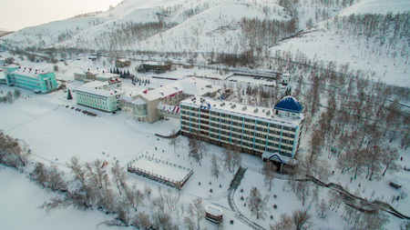 Russian Ural mountains in winter. Aerial view of the lake and the endless landscapesの写真素材