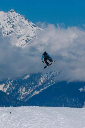 2017 04 Festival NewStarCamp: snowboarder jumps from a high springboardのeditorial素材