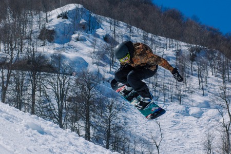 2017 04 Festival NewStarCamp: snowboarder jumps from a high springboardのeditorial素材