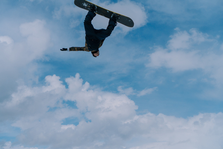 2017 04 Festival NewStarCamp: snowboarder jumps from a high springboard