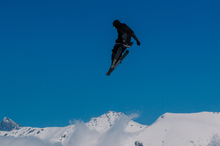 2017 04 Sochi, Russia, Festival NewStarCamp: skier jumps from a high springboardのeditorial素材