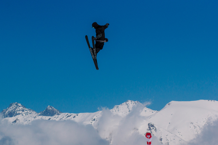 2017 04 Sochi, Russia, Festival NewStarCamp: skier jumps from a high springboardのeditorial素材