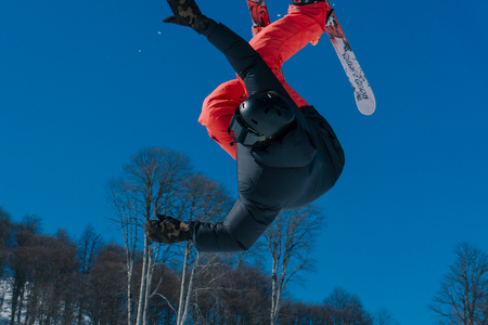 2017 04 Sochi, Russia, Festival NewStarCamp: skier jumps from a high springboardのeditorial素材