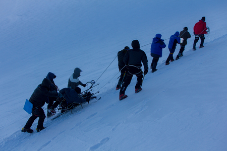 2014 Mount Elbrus, Russia: climbing to the top with a disabled person.のeditorial素材