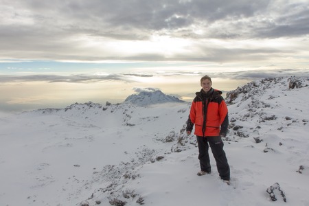 Man photographed on top of Kilimanjaro mountain. 5 dayの写真素材