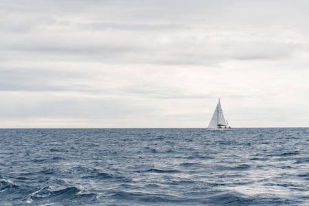 Sailing a yacht in Norwayの写真素材